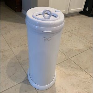 This is an ubbi diaper pail. Includes roll of liner bags.